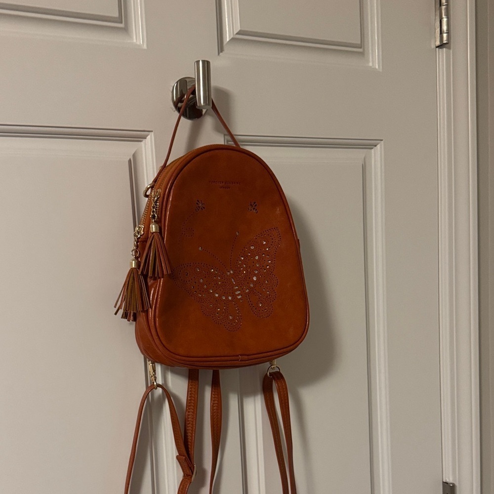 Elegant Tan Butterfly Backpack